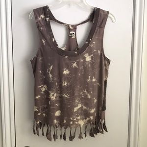 Free People. Brown, fringed top, gently worn. 100% cotton, machine washable.